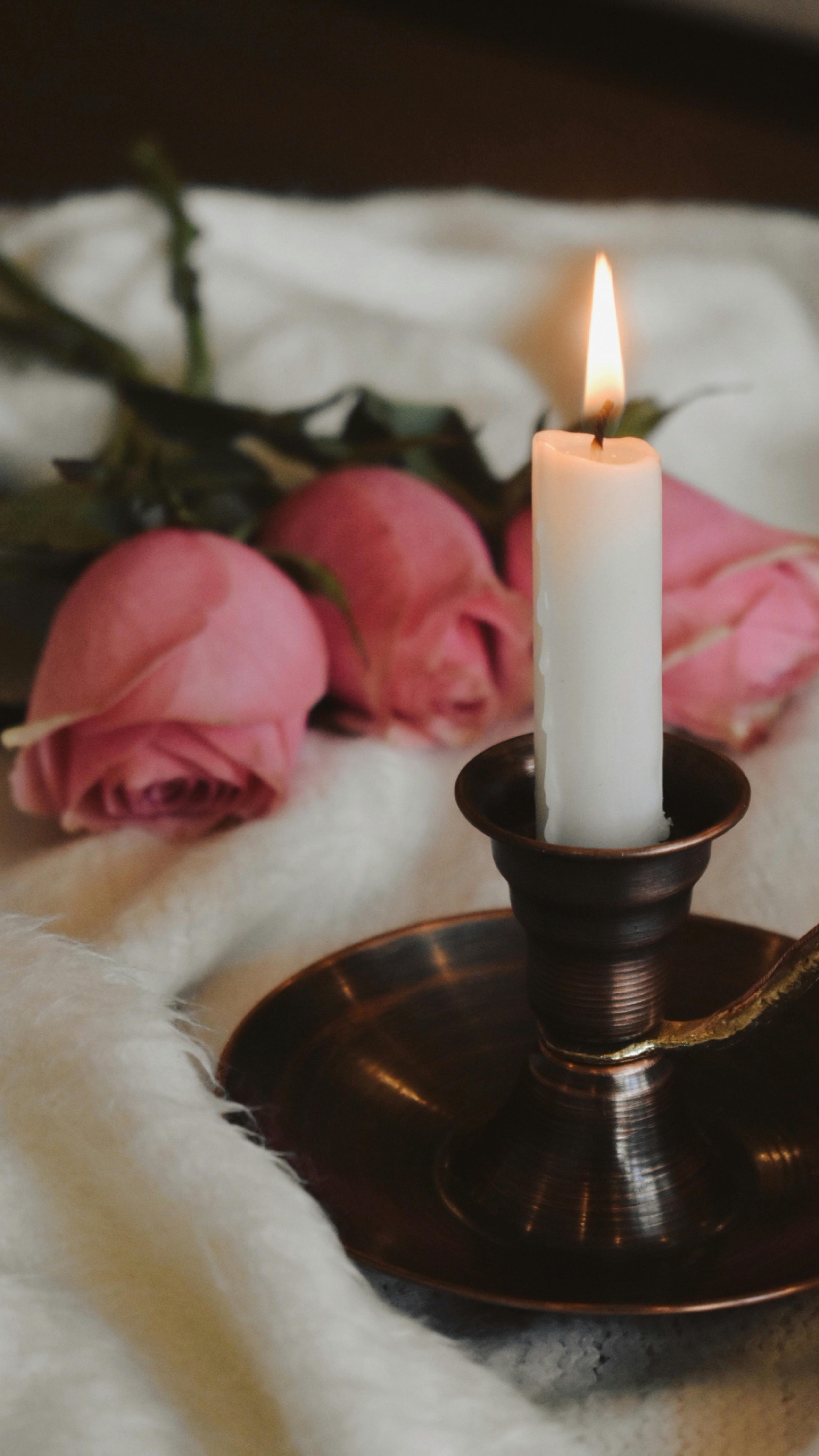 Hand-poured candle with roses